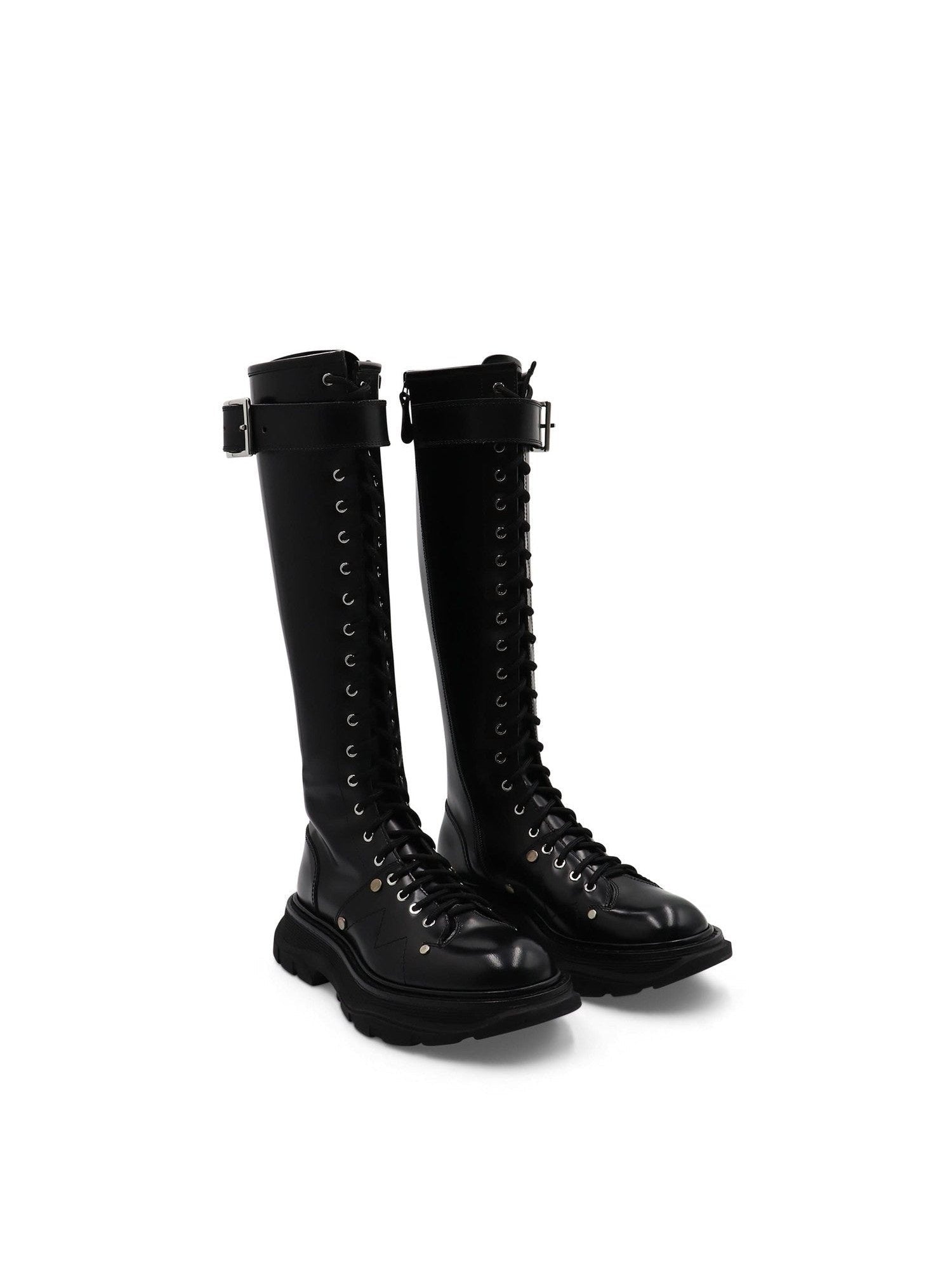 Tread Knee High Lace Up Boots in Black Front View | ALEXANDER MCQUEEN