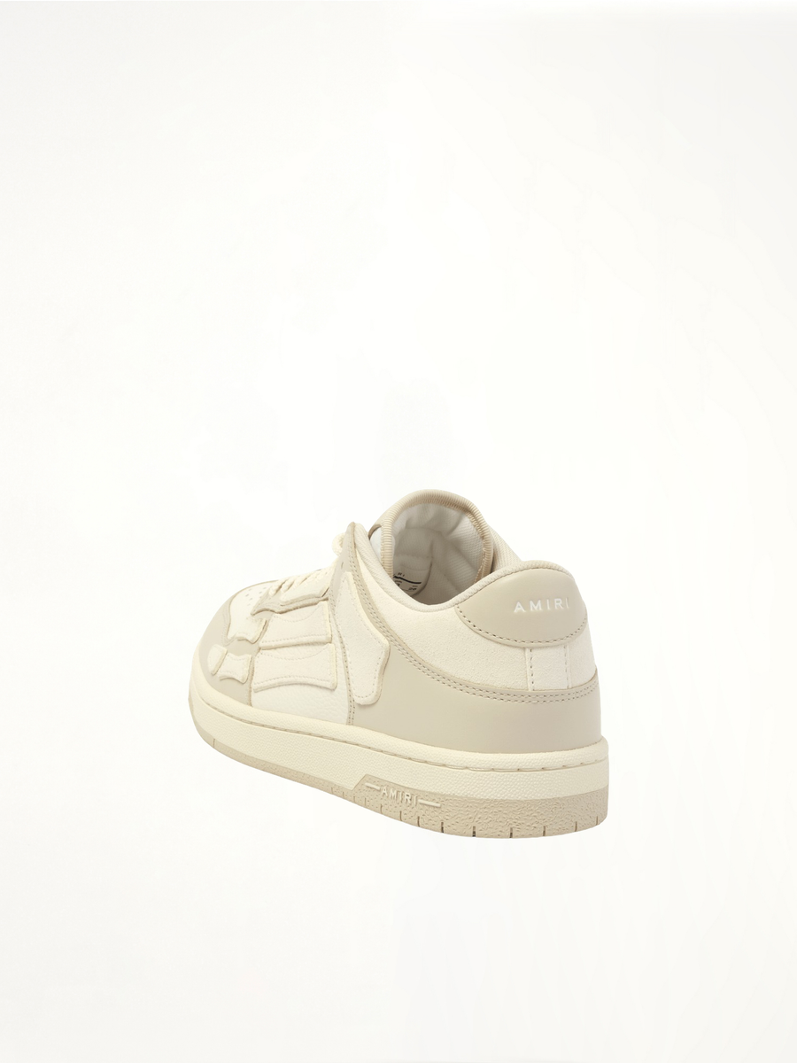 Skeleton Low Top Sneaker in Alabaster Back View | AMIRI