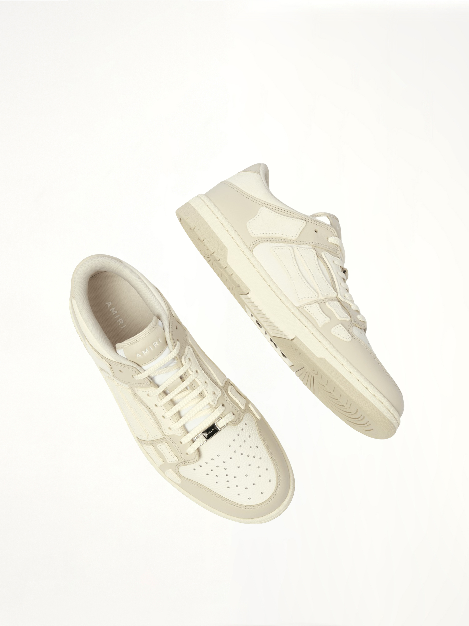 Skeleton Low Top Sneaker in Alabaster Top View | AMIRI