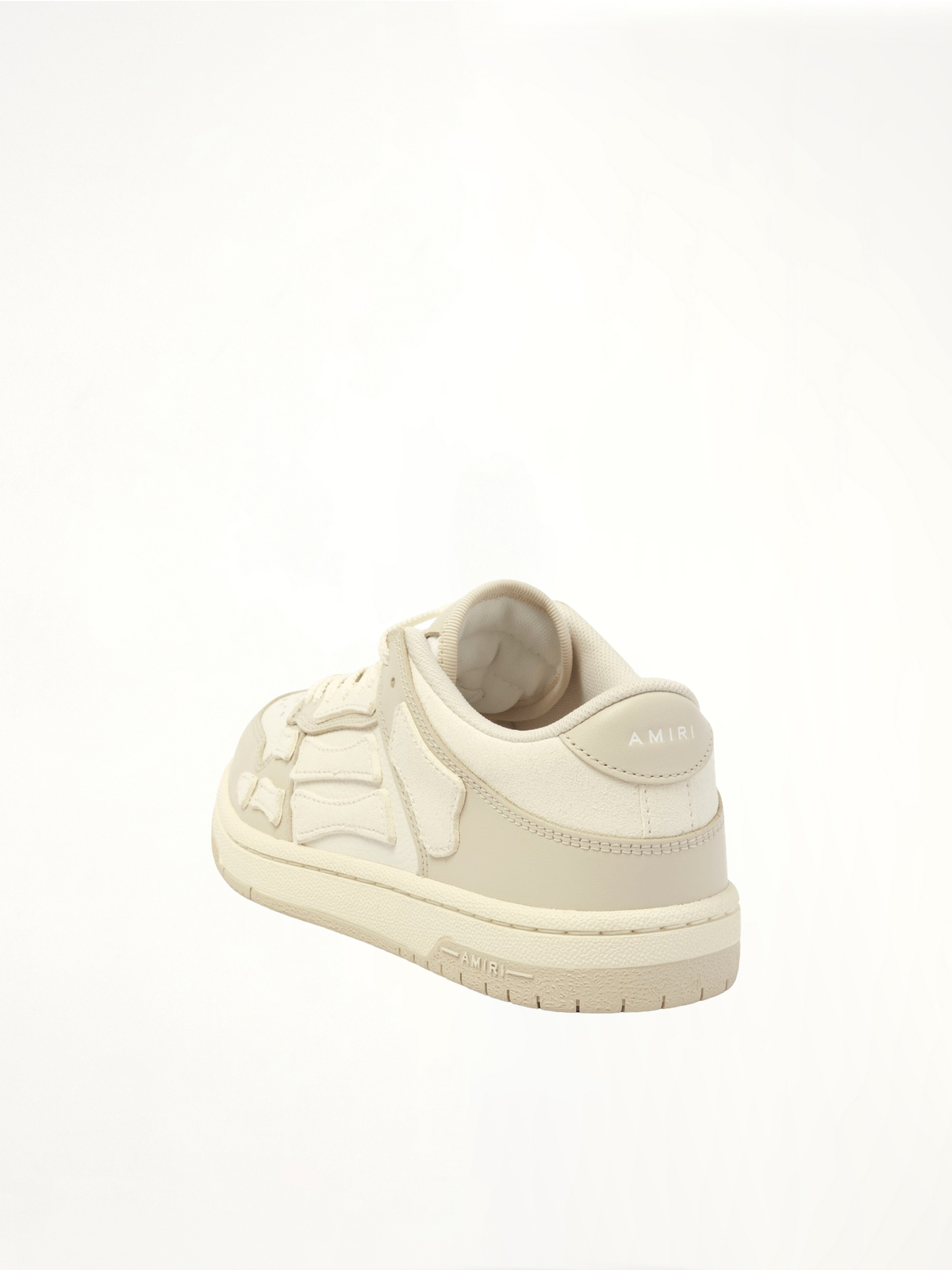 Skeleton Top Low Sneaker in Alabaster Back View | AMIRI