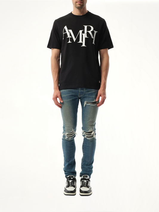 Amiri Staggered Logo T-Shirt in Black