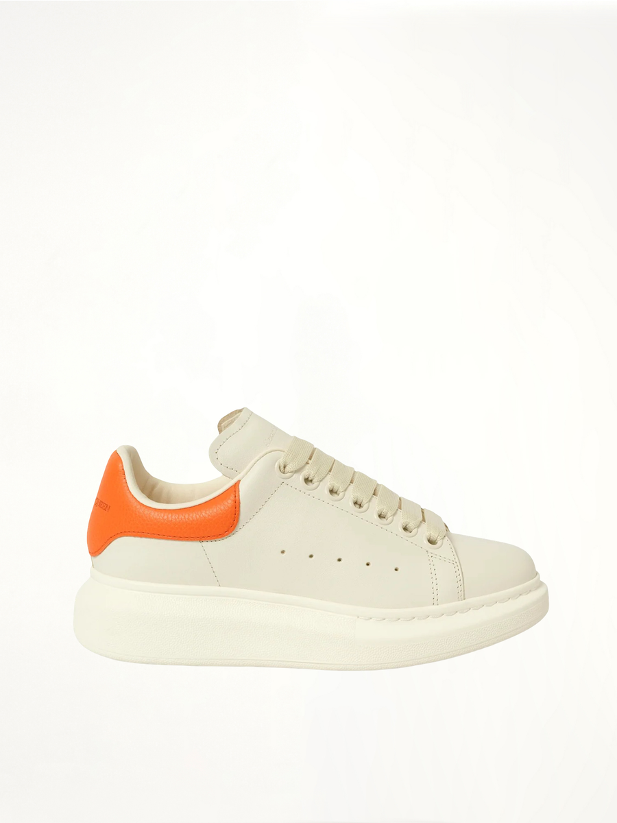 Larry Oversized Sneaker in Off White/Orange Side View | ALEXANDER MCQUEEN