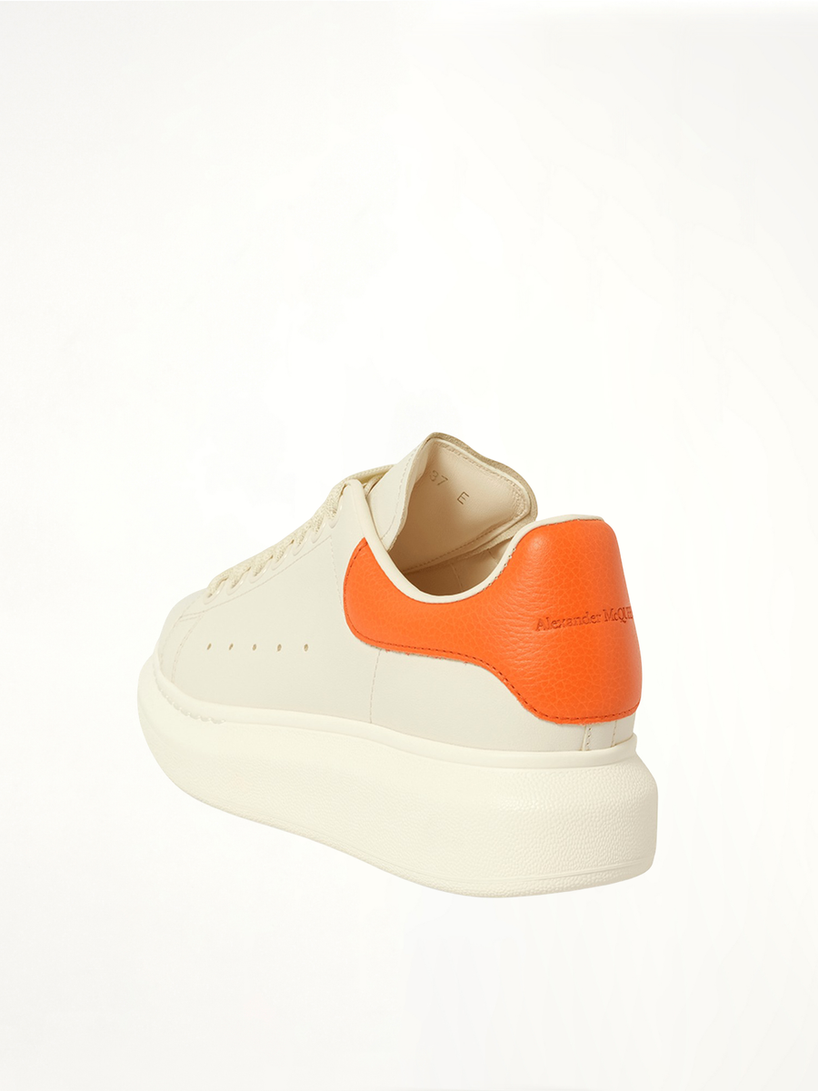 Larry Oversized Sneaker in Off White/Orange Back View | ALEXANDER MCQUEEN