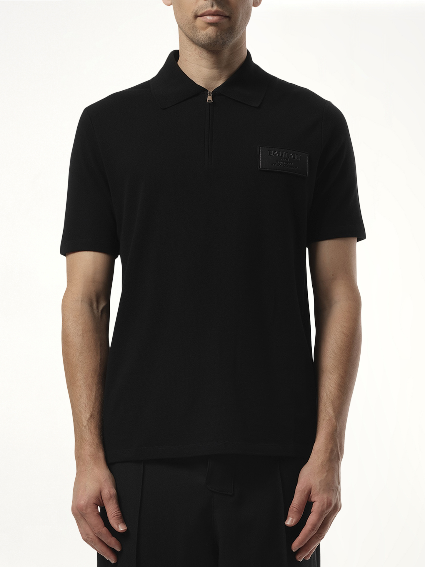 Small Leather Couture Label Zipped Polo in Black