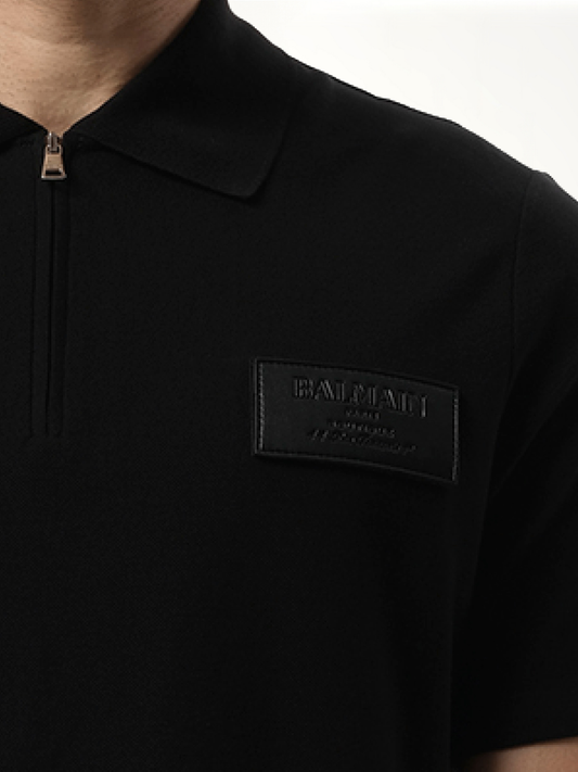 Small Leather Couture Label Zipped Polo in Black