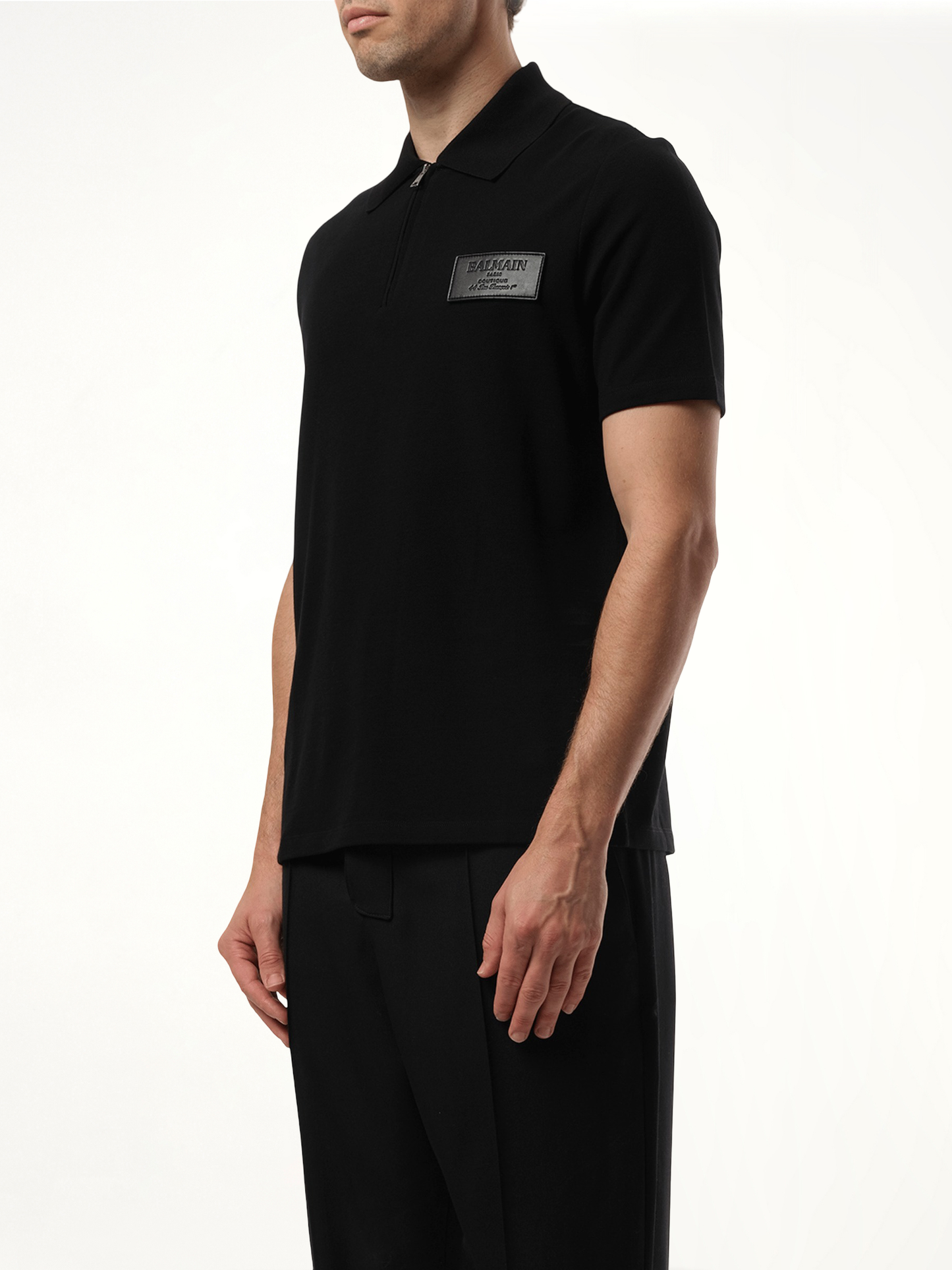 Small Leather Couture Label Zipped Polo in Black