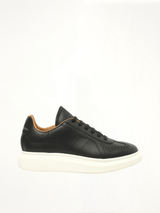 Candid Calf Larry Sneaker in Black/White Side View | ALEXANDER MCQUEEN