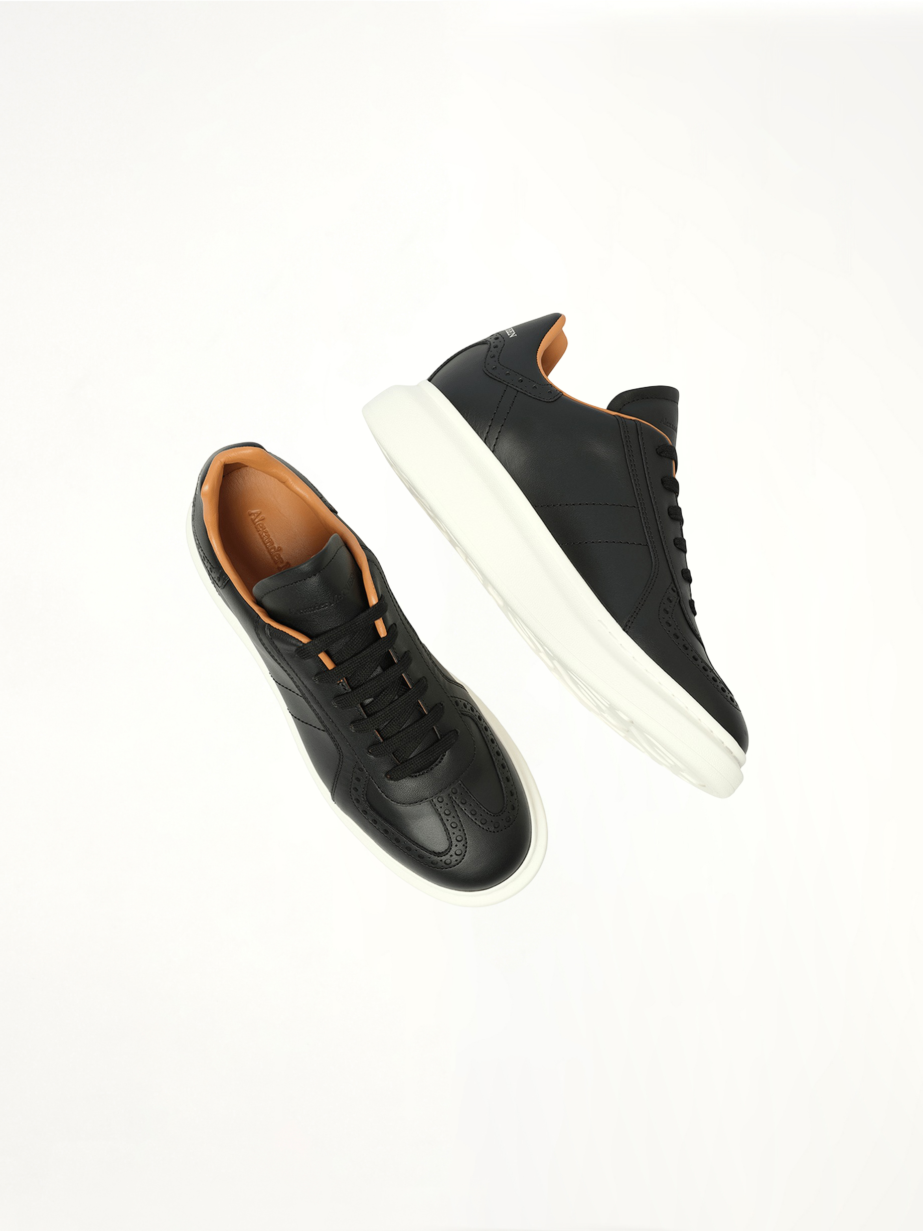 Candid Calf Larry Sneaker in Black/White Top View | ALEXANDER MCQUEEN