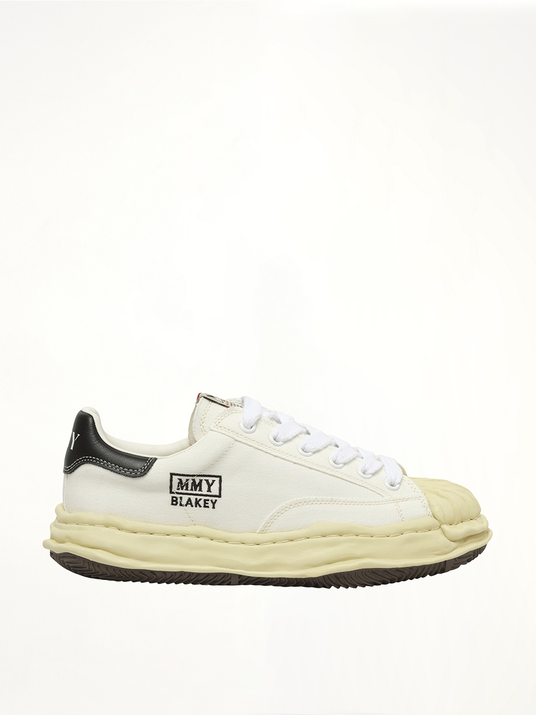 Blakey OG Vintage Leather Low Sneaker in White Side View | MAISON MIHARA YASUHIRO