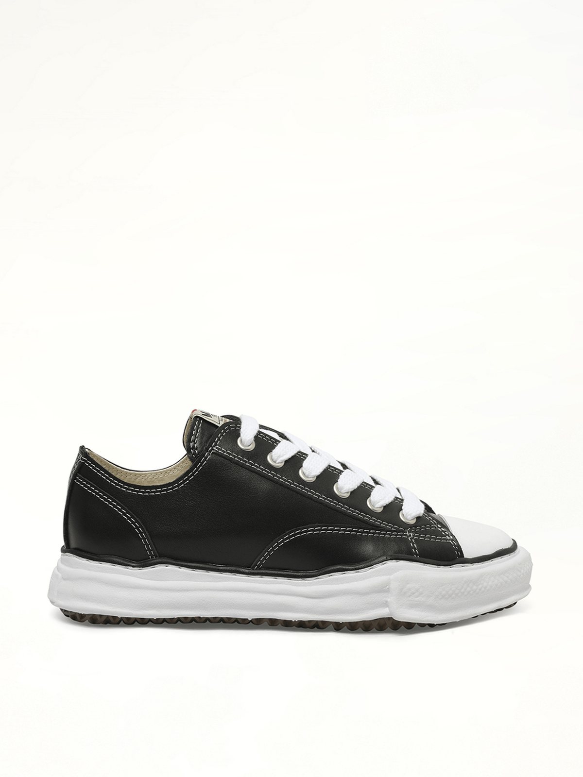 Peterson OG Leather Low Sneaker in Black/White Side View | MAISON MIHARA YASUHIRO