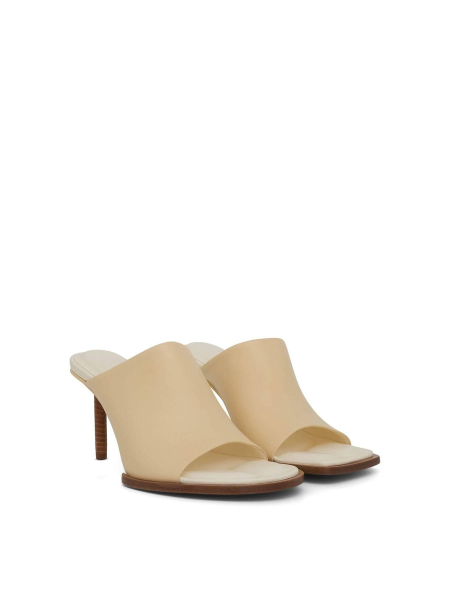 Carre Geometric Mules in Off White Front View | JACQUEMUS
