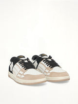 Distressed Skeleton Low Top Sneaker in Black Front View | AMIRI