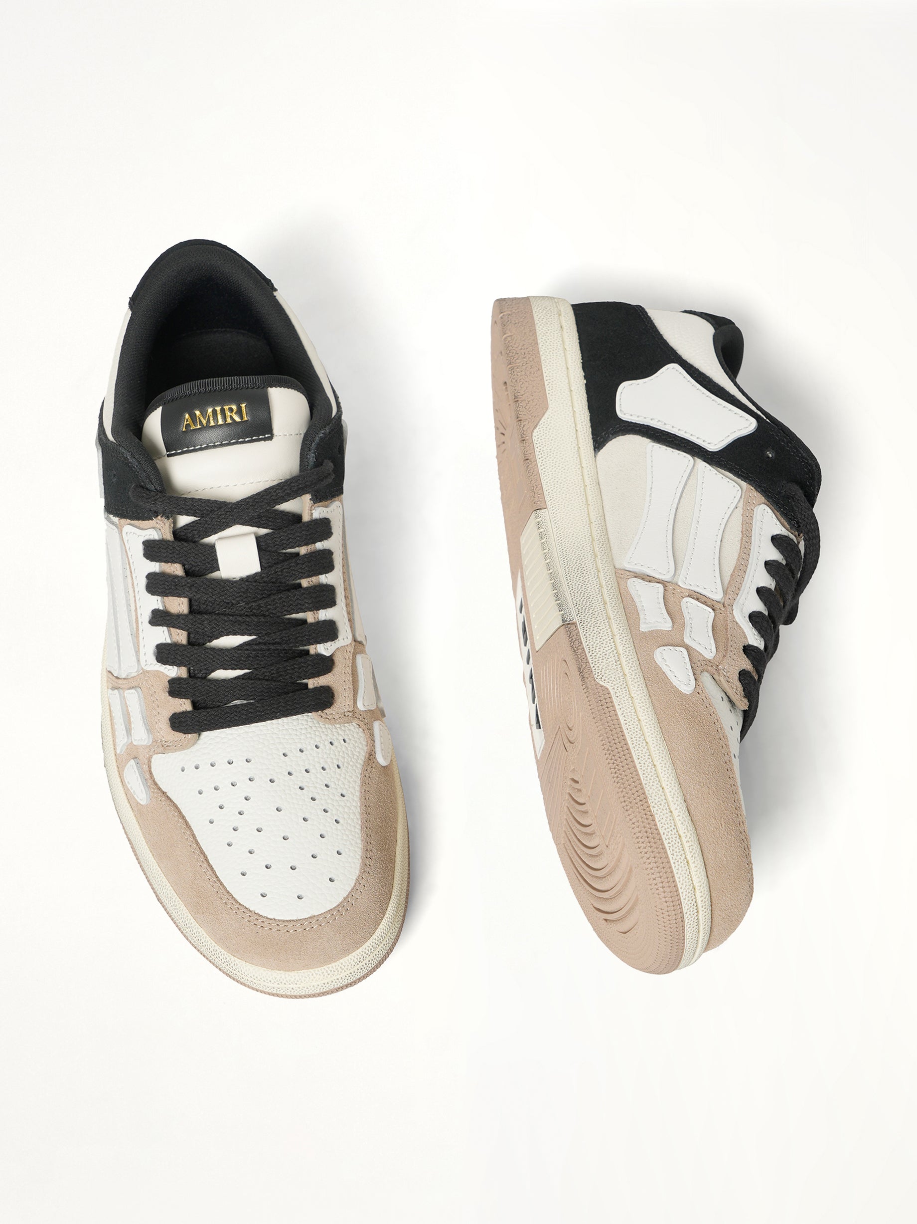 Distressed Skeleton Low Top Sneaker in Black Top View | AMIRI