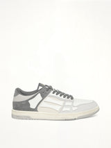 Distressed Skeleton Low Top Sneaker in Dark Grey Side View | AMIRI
