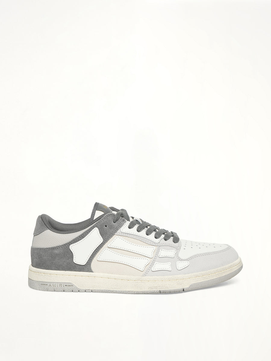 Distressed Skeleton Low Top Sneaker in Dark Grey Side View | AMIRI