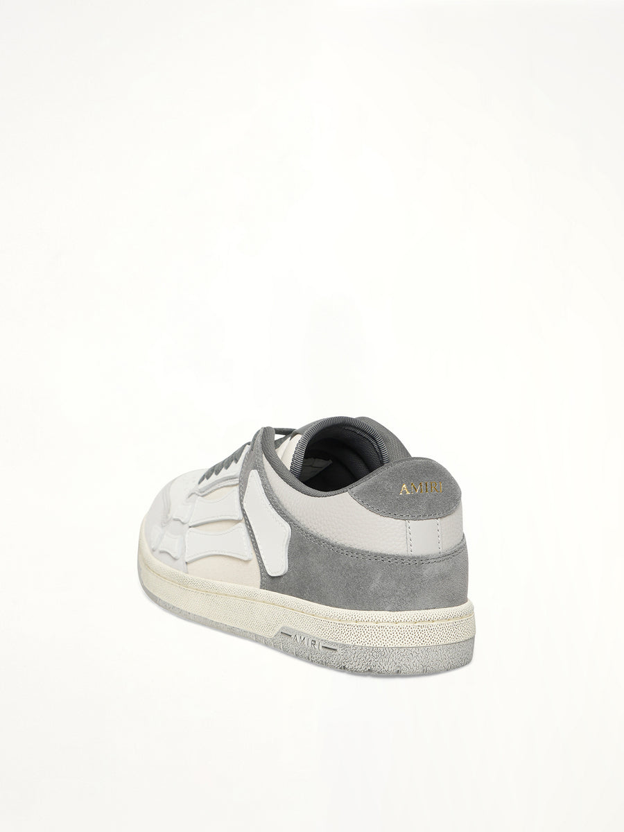 Distressed Skeleton Low Top Sneaker in Dark Grey Back View | AMIRI