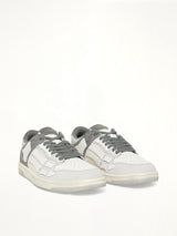 Distressed Skeleton Low Top Sneaker in Dark Grey Front View | AMIRI