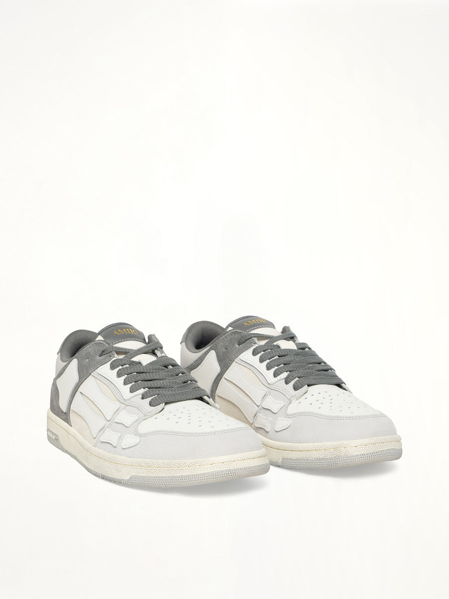 Distressed Skeleton Low Top Sneaker in Dark Grey Front View | AMIRI