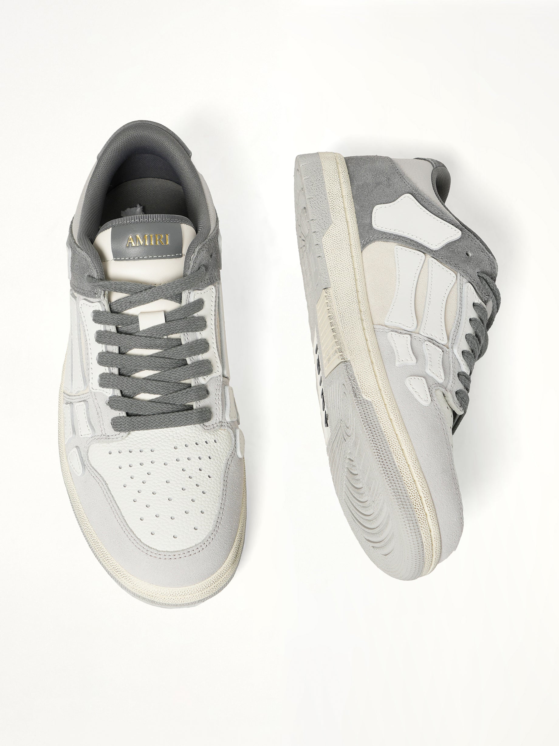 Distressed Skeleton Low Top Sneaker in Dark Grey Top View | AMIRI