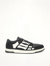 Boucle Skeleton Low Top Sneaker in Black Side View | AMIRI