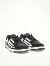 Boucle Skeleton Low Top Sneaker in Black Front View | AMIRI
