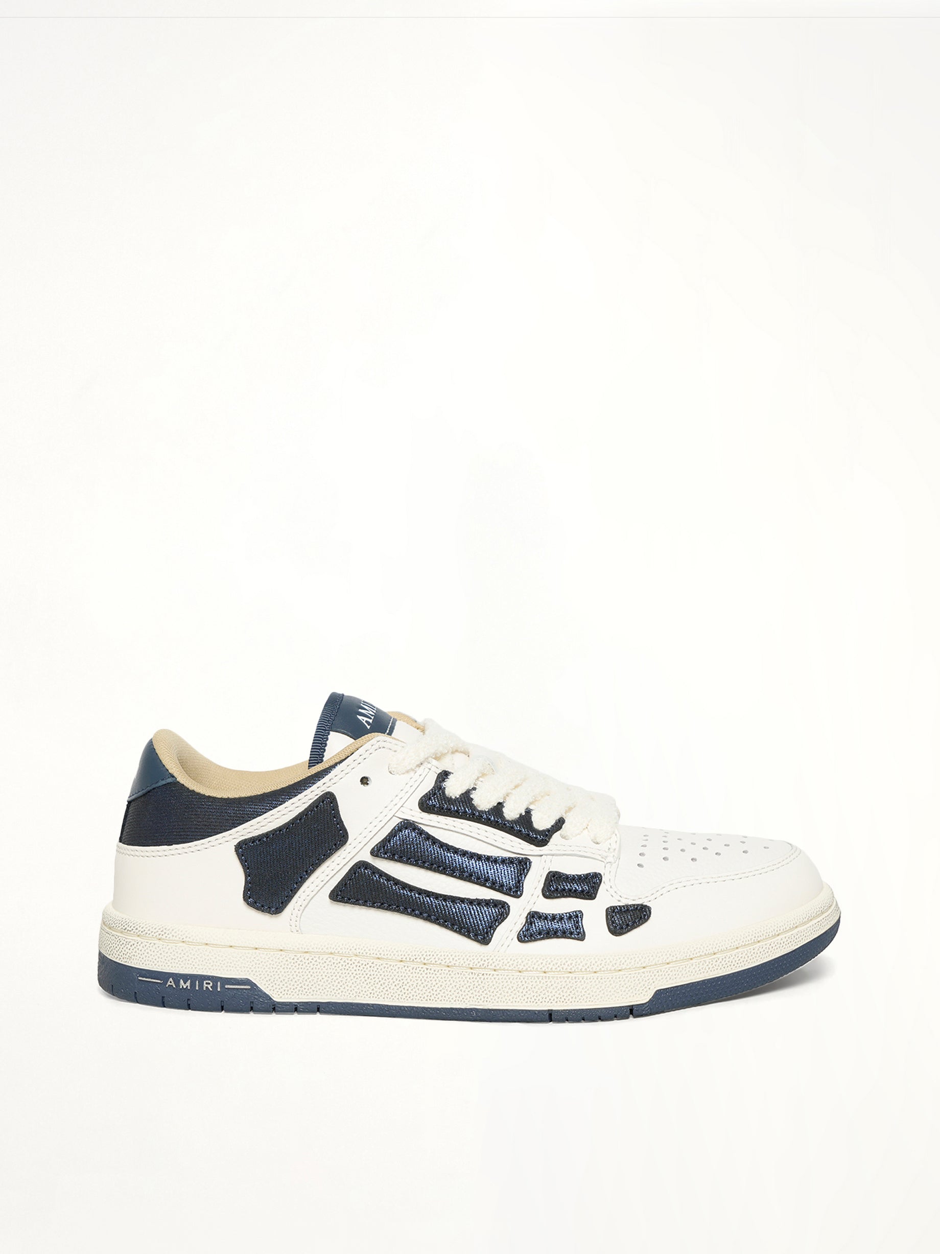 Denim Skeleton Low Top Sneakers in Wet Shimmer Side View | AMIRI
