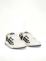 Denim Skeleton Low Top Sneakers in Wet Shimmer Front View | AMIRI