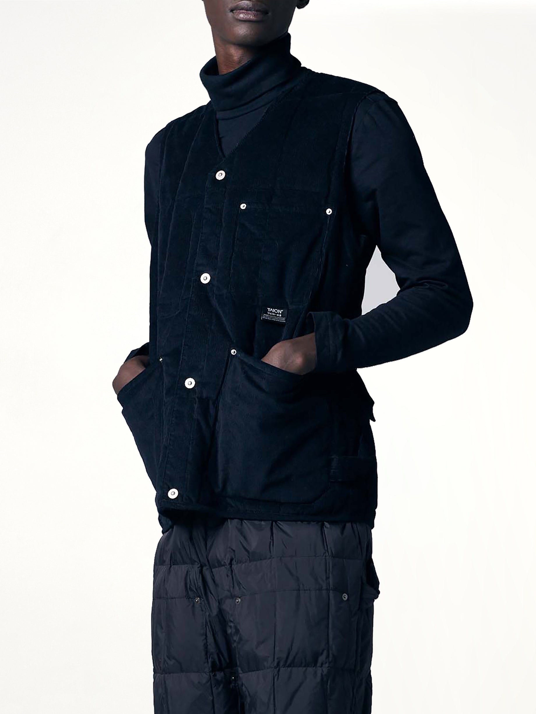 TAION Work V Neck Button Down Vest in Black Side View from MARAIS