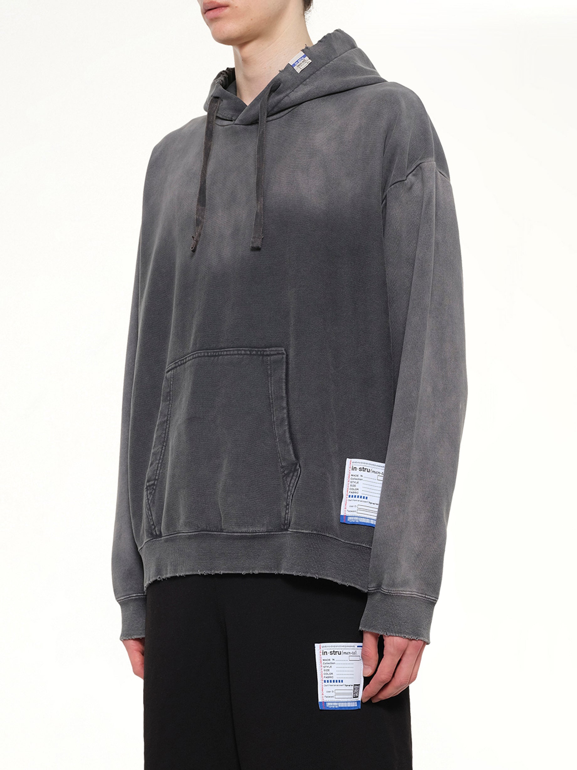 MAISON MIHARA YASUHIRO Instrumental French Terry Distressed Hoodie in Black Side View from MARAIS