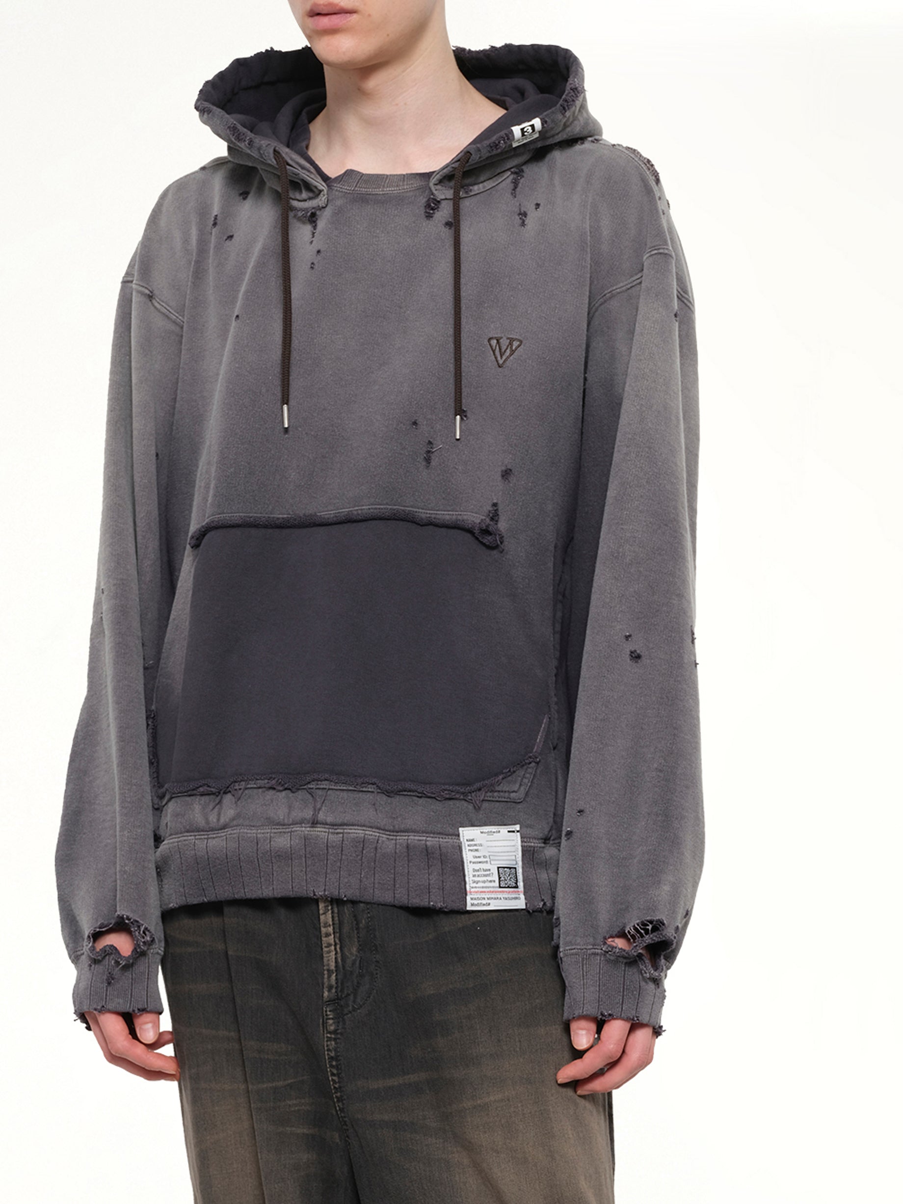 MAISON MIHARA YASUHIRO Sun Faded Hoodie in Black Detail Shot from MARAIS
