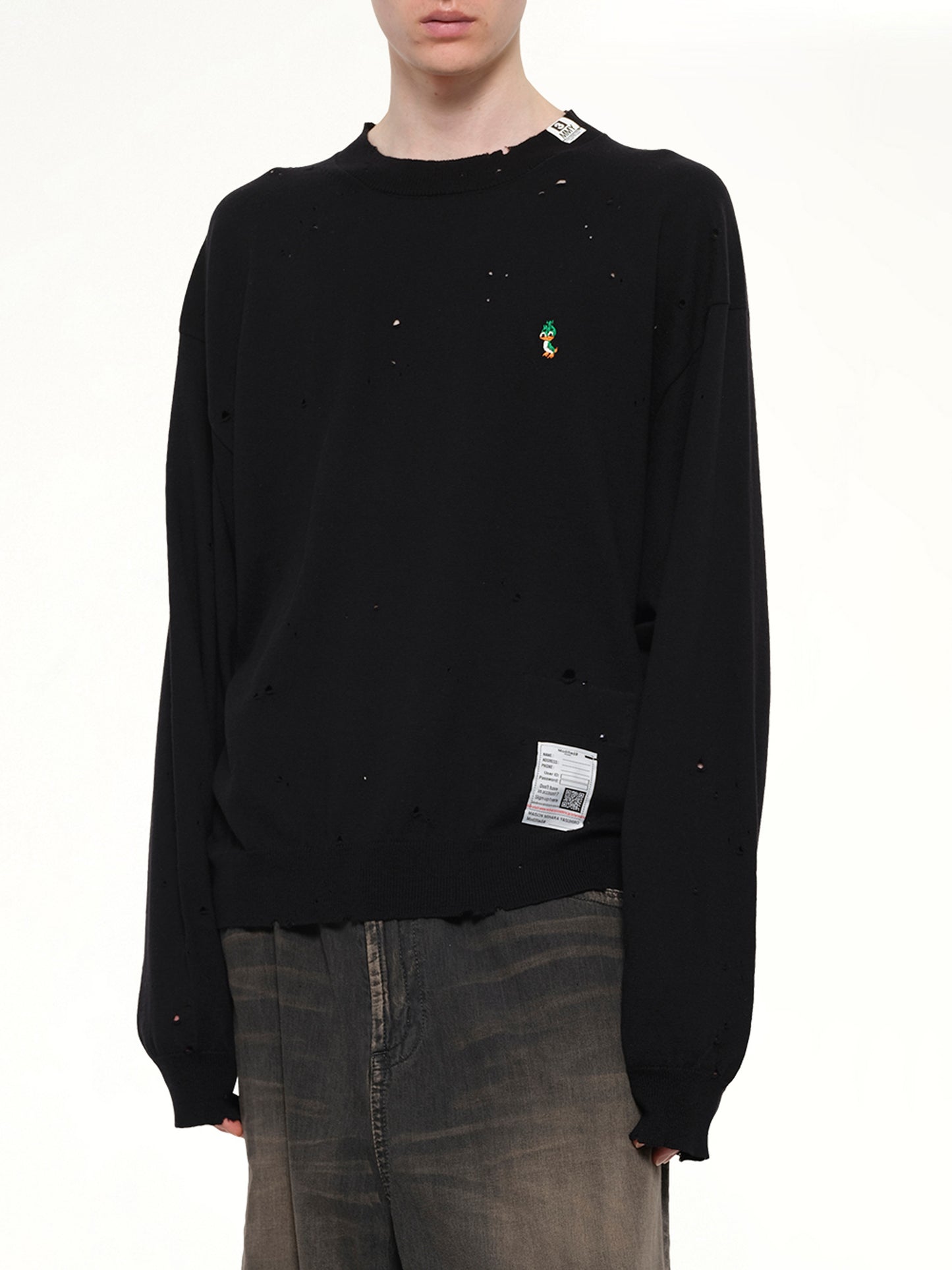 Distressed Knit Pullover in Black