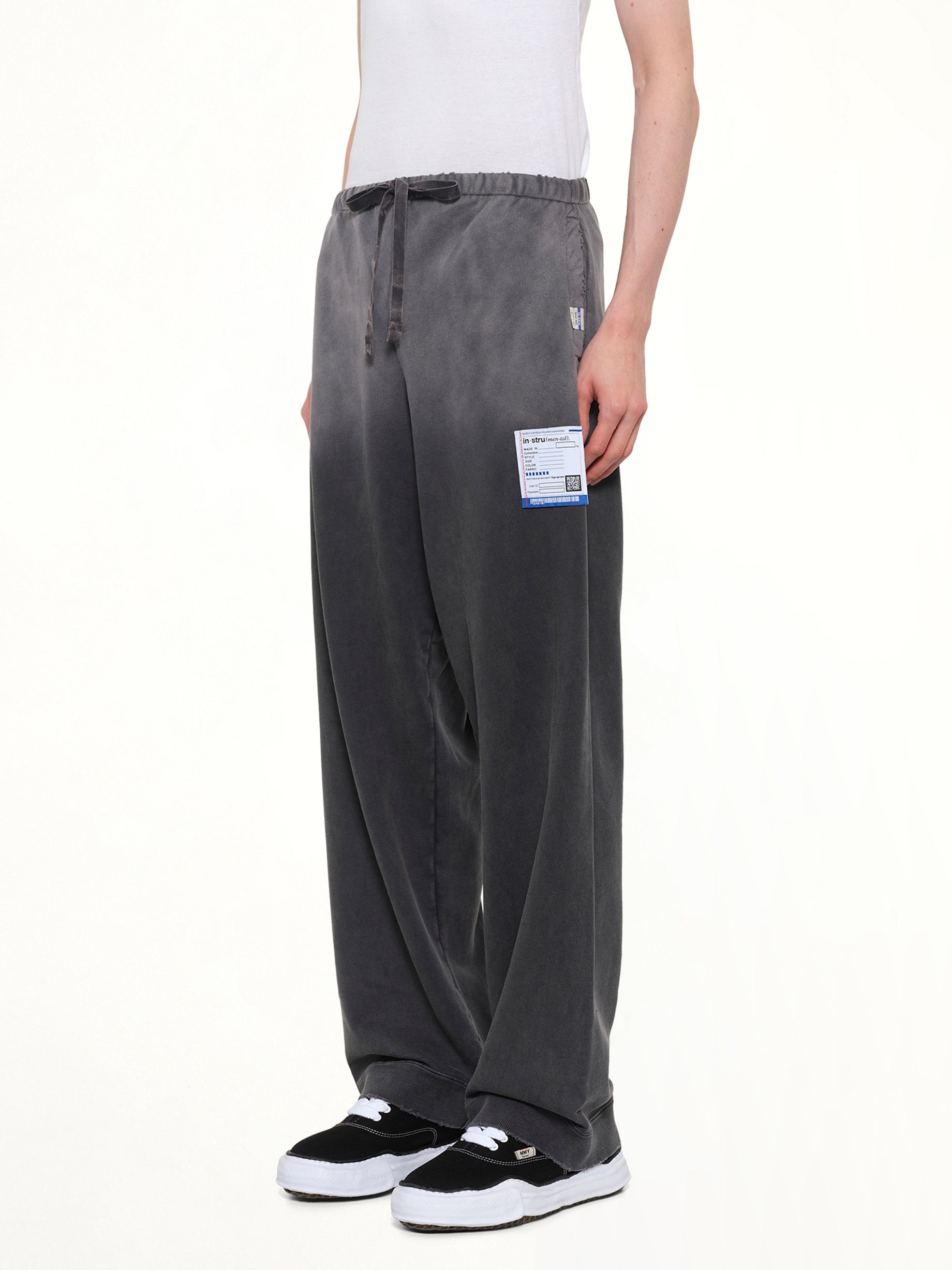 MAISON MIHARA YASUHIRO Instrumental French Terry Distressed Easy Pants in Black Side View from MARAIS