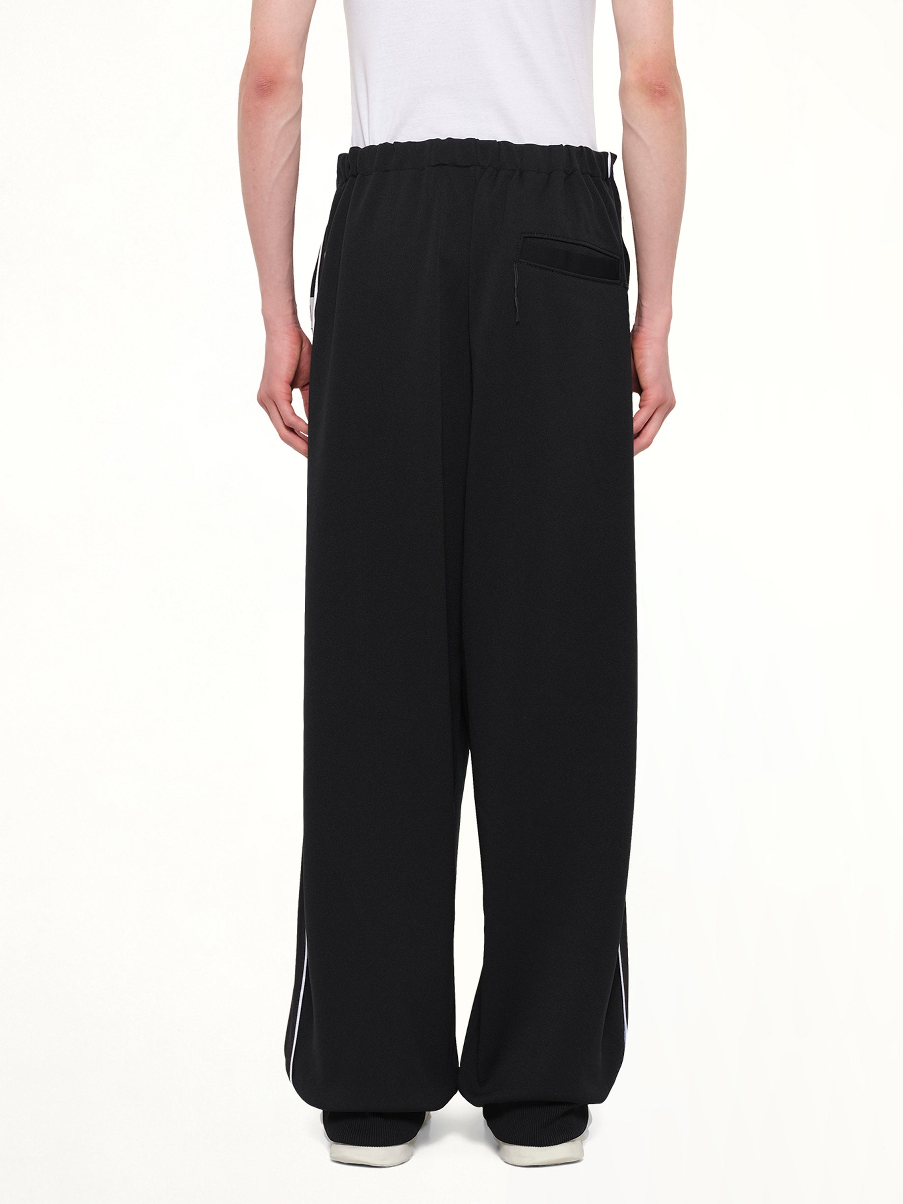 MAISON MIHARA YASUHIRO Amateur Sewn Track Pants in Black Back View from MARAIS