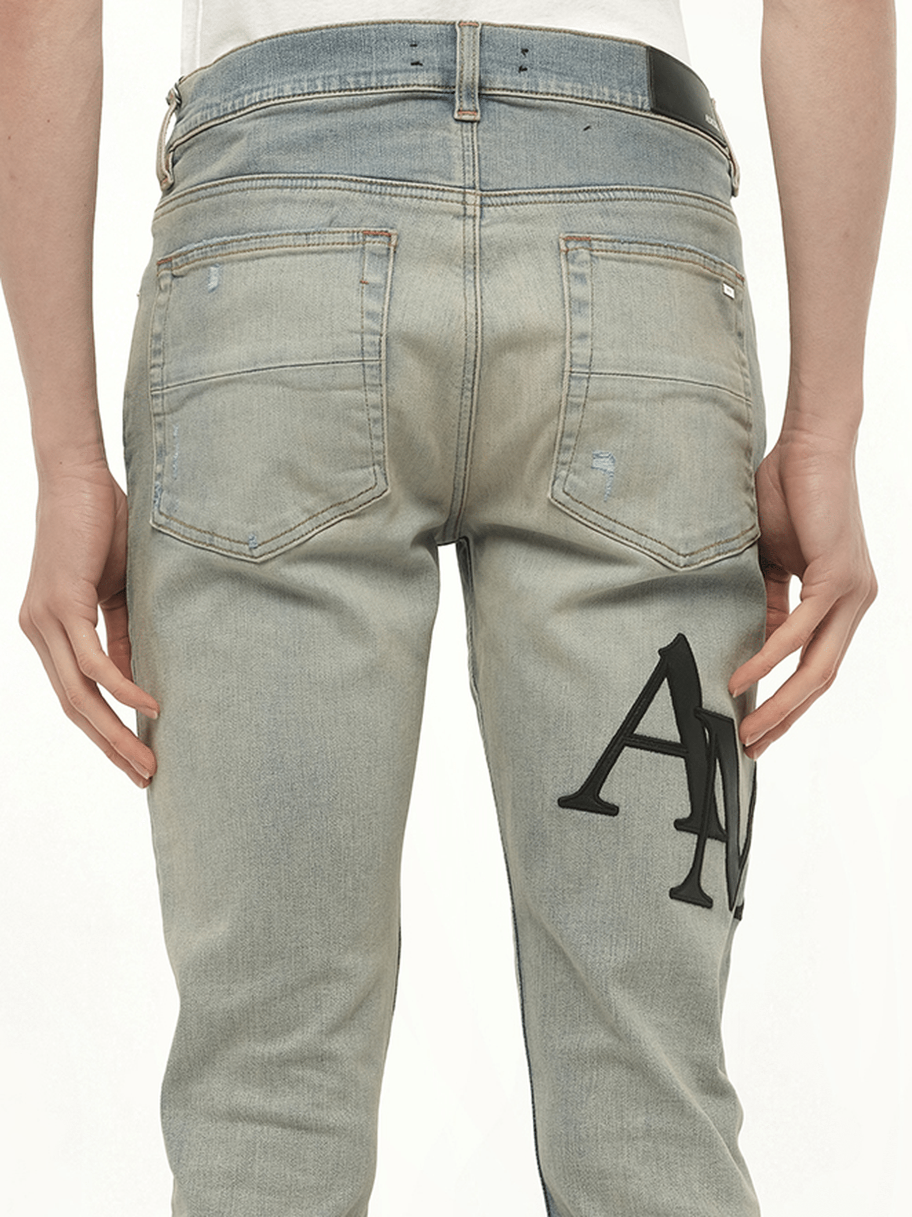 Staggered Logo Skinny Jeans in Antique Indigo/Black