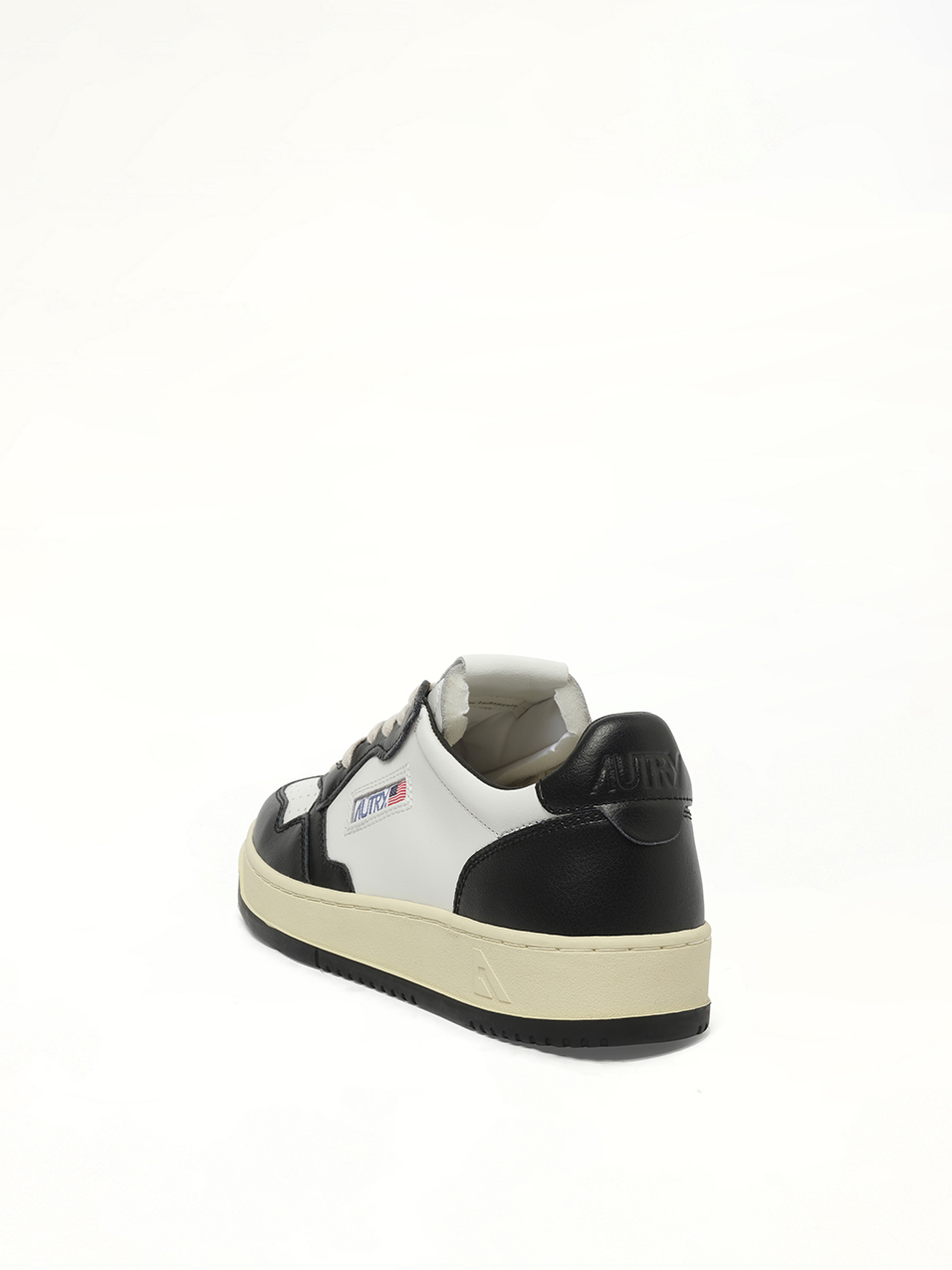 Medalist Low Bicolour Sneakers in White/Black Top View | AUTRY