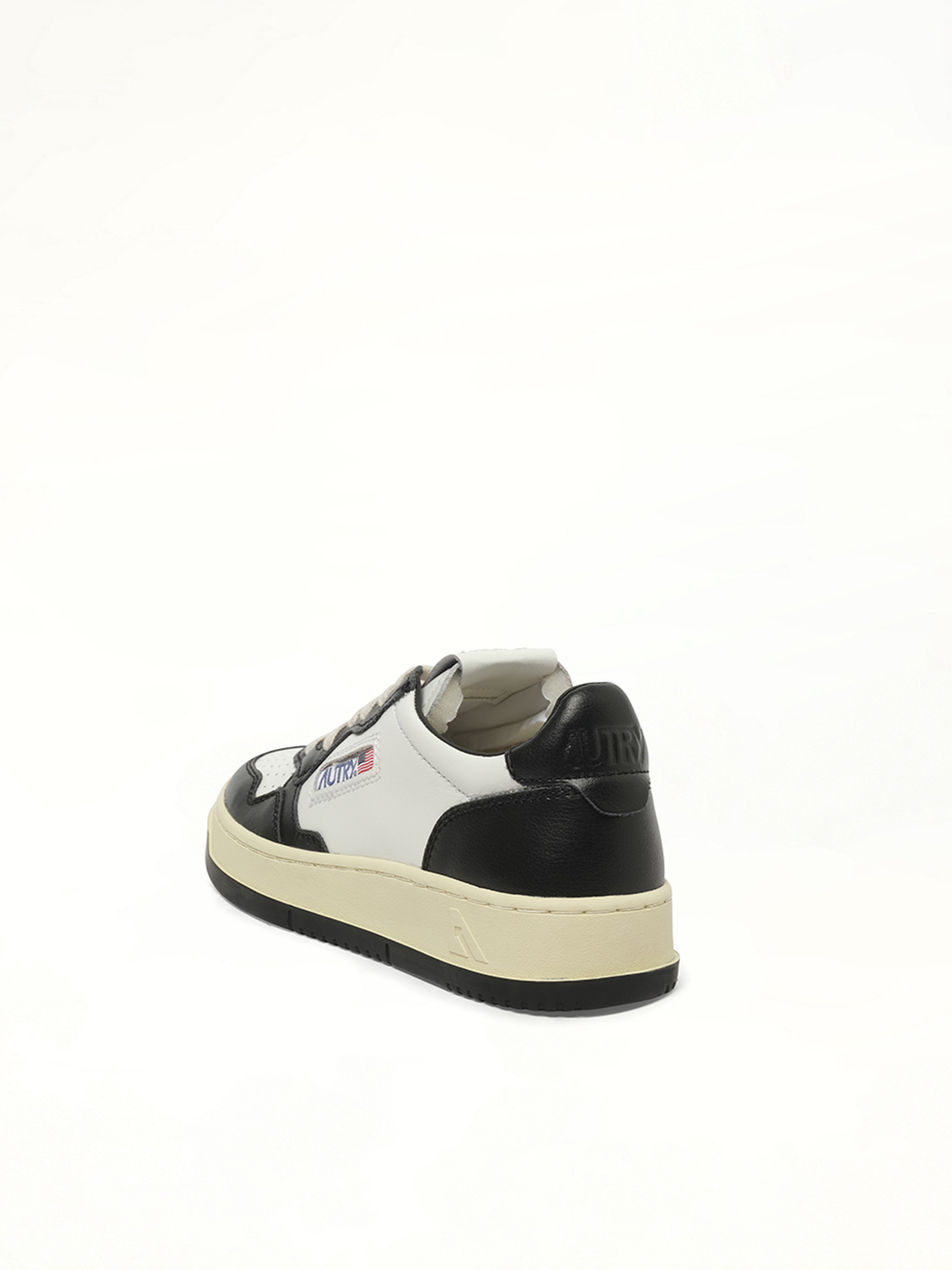 Medalist Low Bicolour Sneakers in White/Black Top View | AUTRY