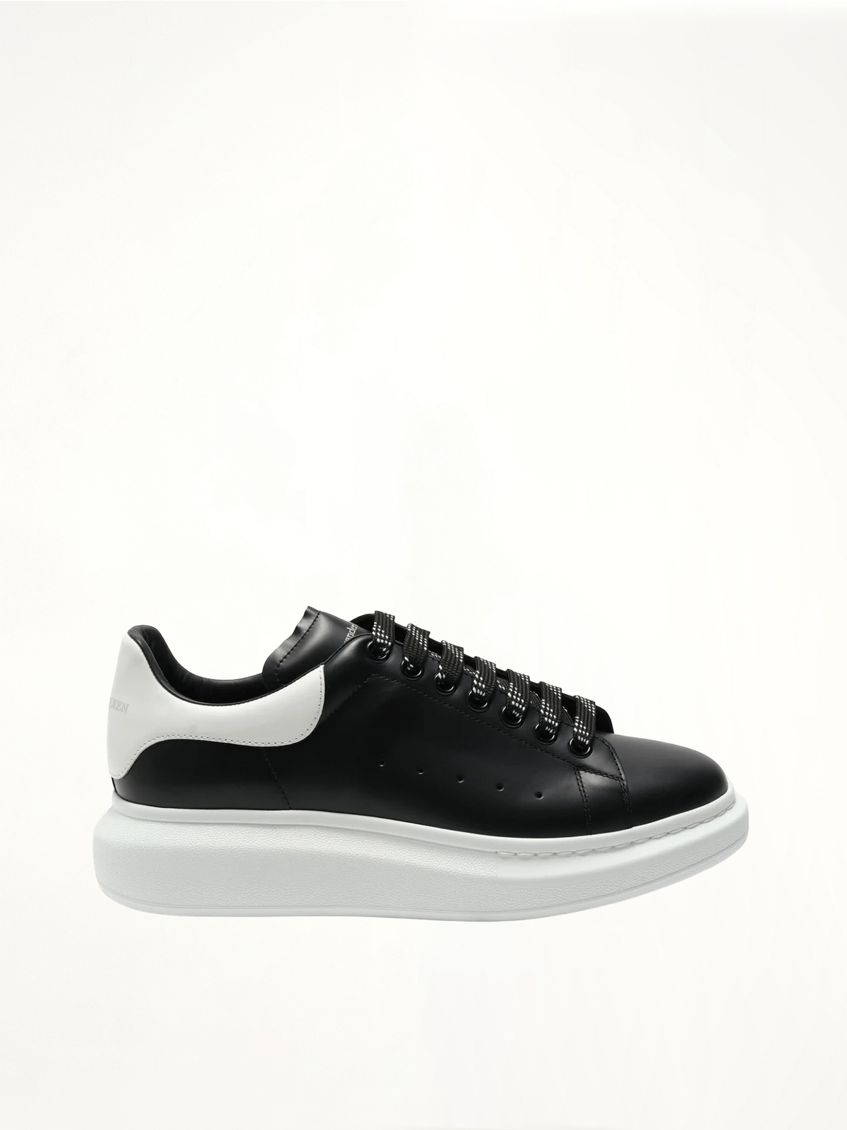 Larry Oversized Sneaker in Black/White Side View | ALEXANDER MCQUEEN