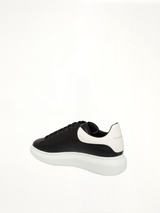 Larry Oversized Sneaker in Black/White Back View | ALEXANDER MCQUEEN