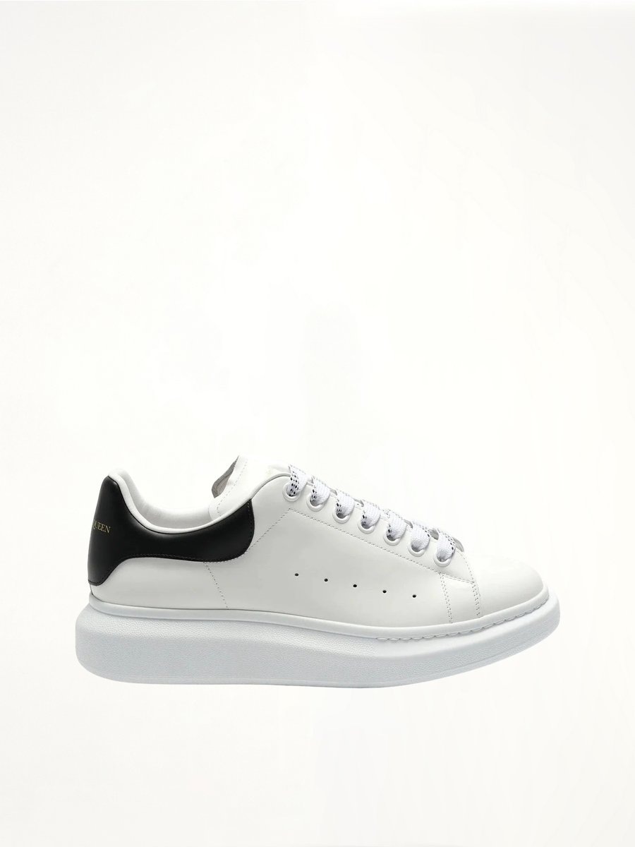Larry Oversized Sneaker in White/Black Side View | ALEXANDER MCQUEEN