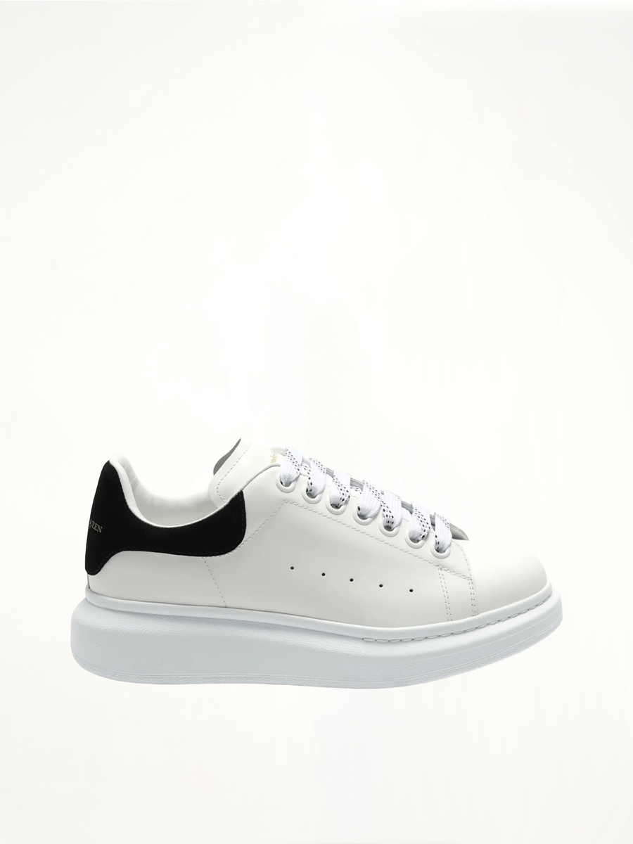 Larry Oversized Suede Sneakers in White/Black Side View | ALEXANDER MCQUEEN