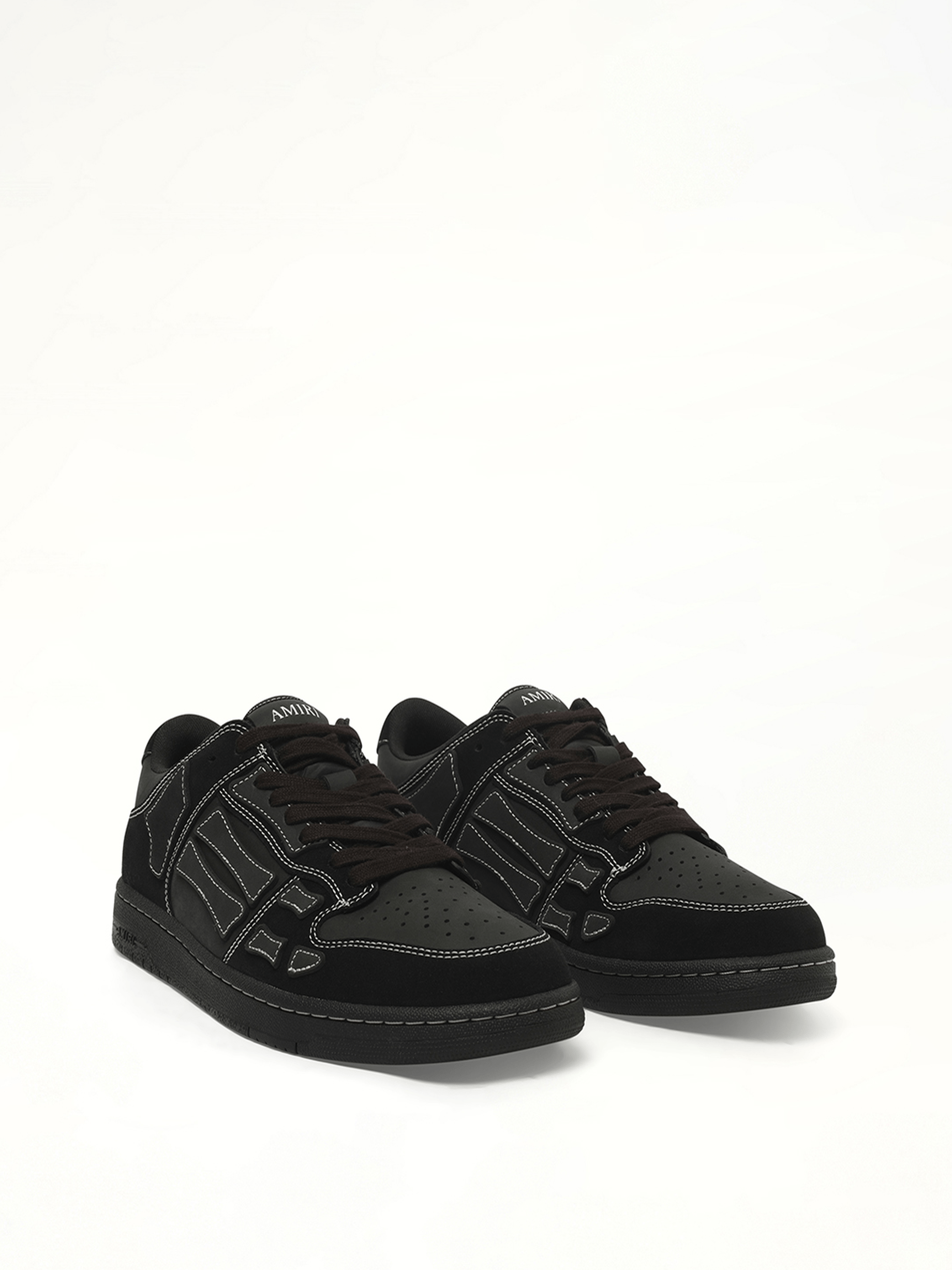 Skeleton Top Low Sneaker in Black Front View | AMIRI