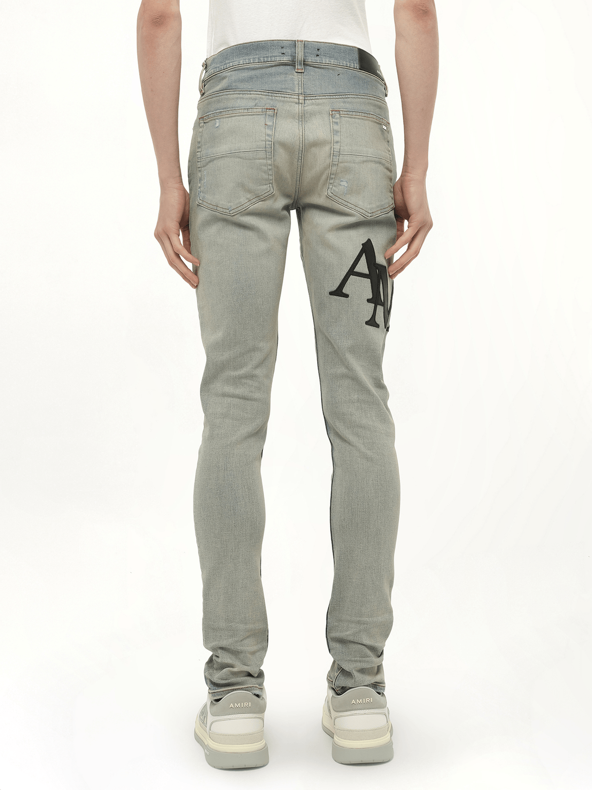 Staggered Logo Skinny Jeans in Antique Indigo/Black