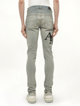 Staggered Logo Skinny Jeans in Antique Indigo/Black