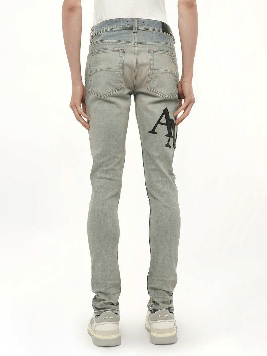 Staggered Logo Skinny Jeans in Antique Indigo/Black