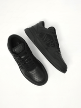 Classic Low Sneaker in Black/Black Back View | AMIRI
