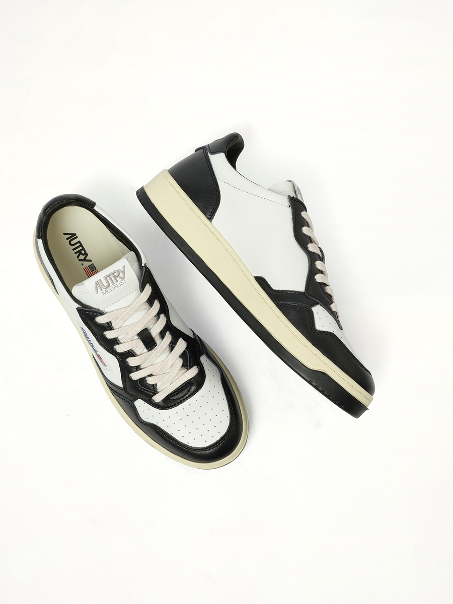 Medalist Low Bicolour Sneakers in White/Black Back View | AUTRY