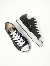 Peterson OG Leather Low Sneaker in Black/White Back View | MAISON MIHARA YASUHIRO