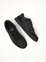 Skeleton Top Low Sneaker in Black Back View | AMIRI