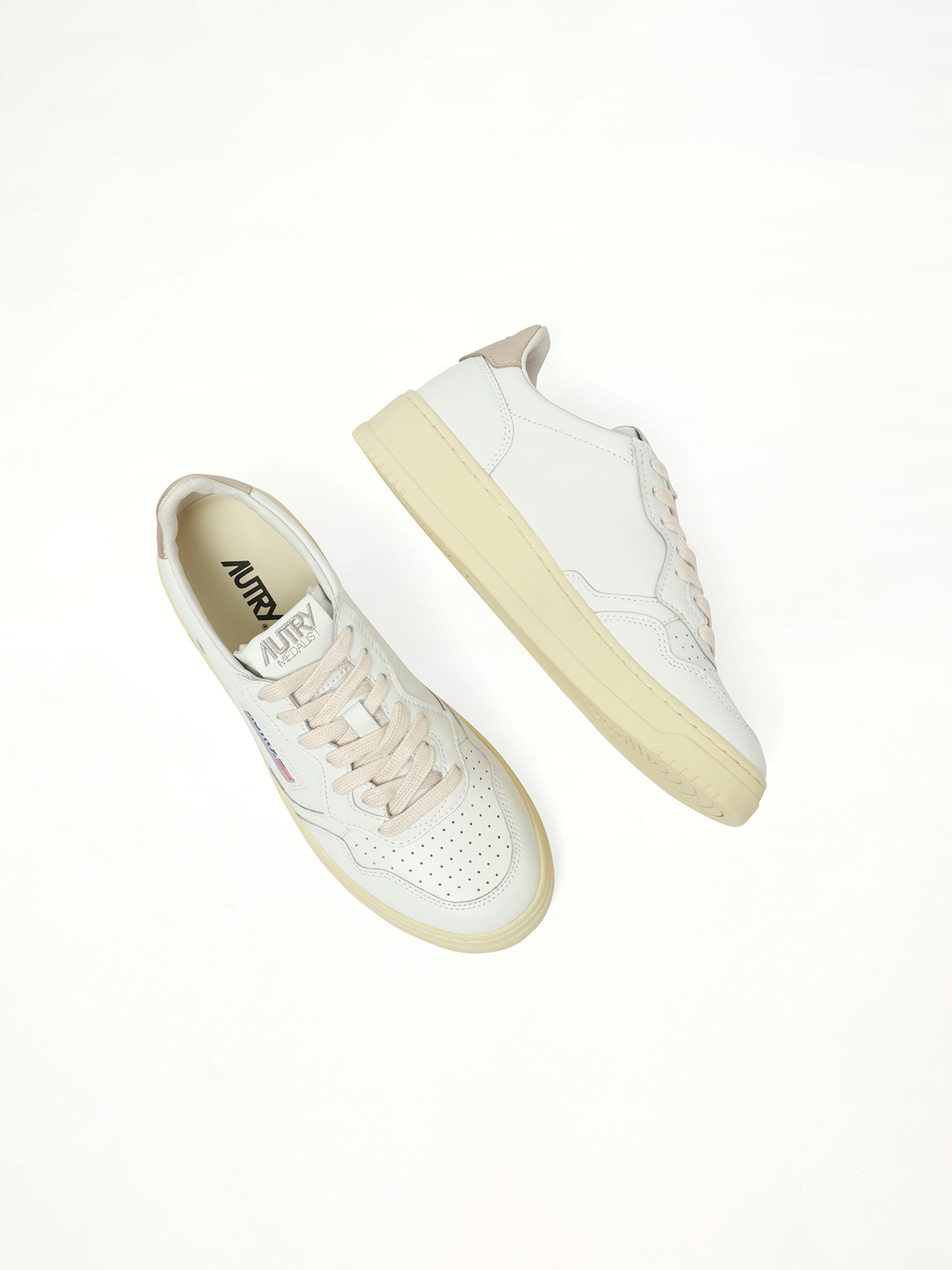 Medalist Low Sneakers in White/Gold Back View | AUTRY