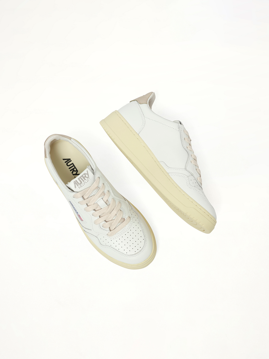 Medalist Low Sneakers in White/Gold Back View | AUTRY